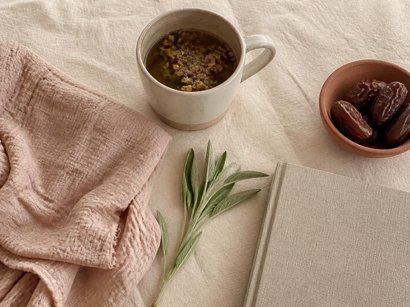 A curated flatlay of Mamta Collective postpartum essentials